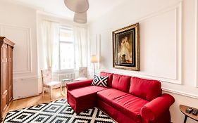 Golden Esthetic With Red Sofa Apartment